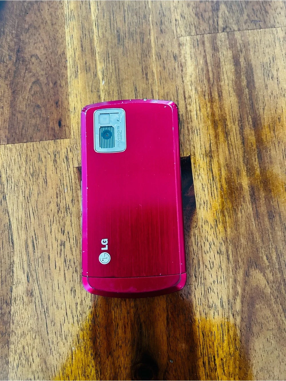 LG CU720 Red Slider Phone with Charger and Black Leather Holster